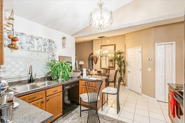 2595 Diane Ave SE, Palm Bay, FL 32909 - kitchen with dishwasher, a chandelier, light tile patterned floors, vaulted ceiling, and decorative light fixtures