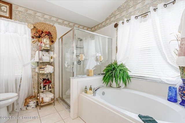 2595 Diane Ave SE, Palm Bay, FL 32909 - bathroom with tile patterned flooring, a garden tub, a stall shower, and vaulted ceiling