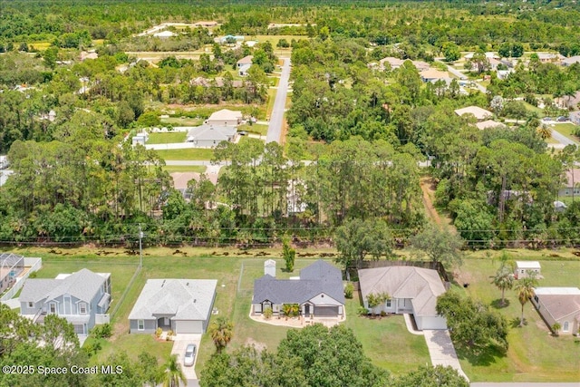 2595 Diane Ave SE, Palm Bay, FL 32909 - aerial perspective of suburban area featuring a forest