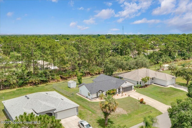 2595 Diane Ave SE, Palm Bay, FL 32909 - aerial view of property and surrounding area featuring a forest