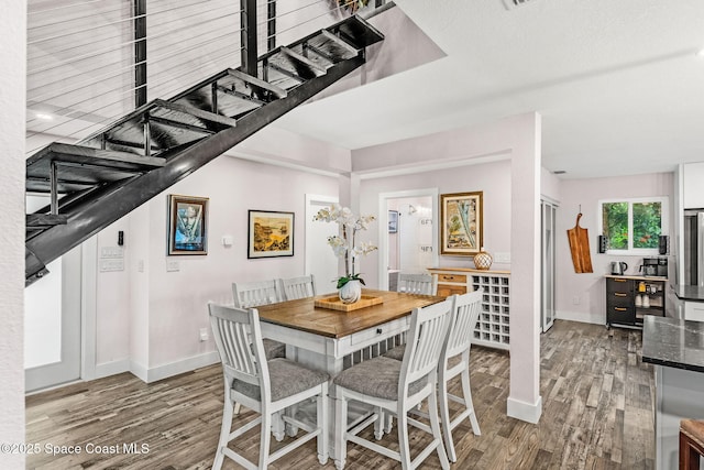 1379 Rose Ct, Melbourne, FL 32935 - dining space with wood finished floors and baseboards