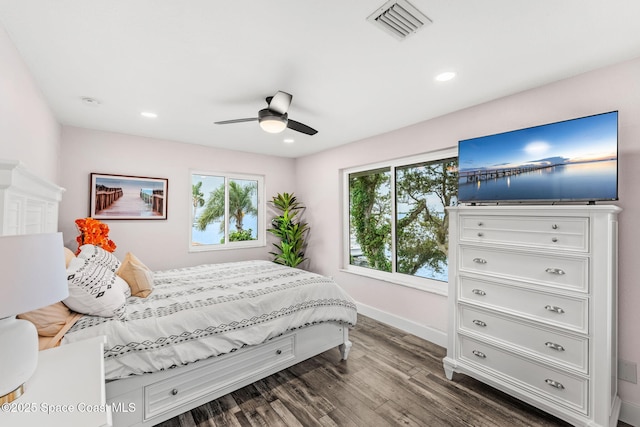 1379 Rose Ct, Melbourne, FL 32935 - bedroom featuring dark wood-style flooring, ceiling fan, and recessed lighting