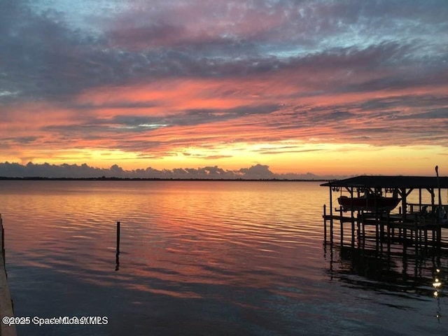 1379 Rose Ct, Melbourne, FL 32935 - dock area featuring boat lift and a water view