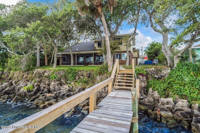 1379 Rose Ct, Melbourne, FL 32935 - back of house featuring stairway and a water view
