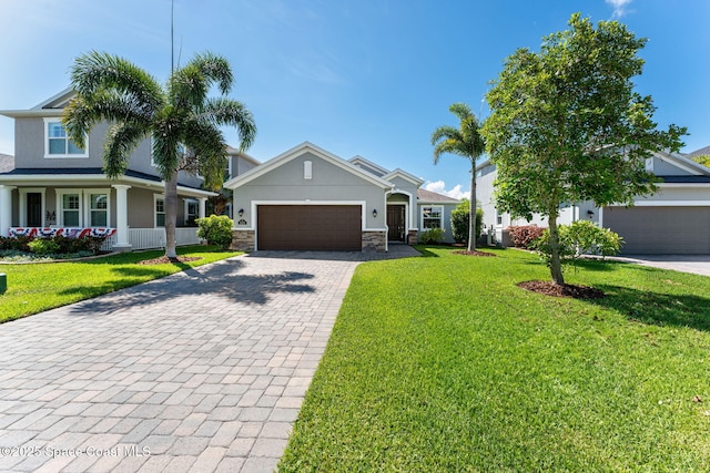 2920 Casterton Dr, Melbourne, FL 32940 - view of front of property featuring decorative driveway, a garage, stucco siding, and a front lawn