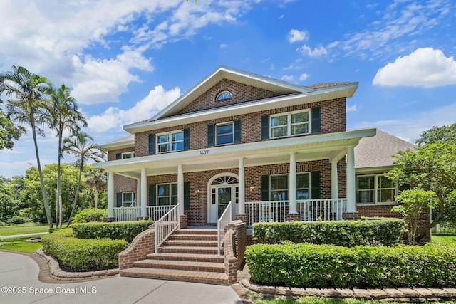 1407 Rockledge Dr, Rockledge, FL 32955 - view of front of house with brick siding and covered porch