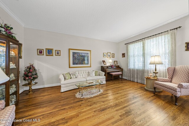 1407 Rockledge Dr, Rockledge, FL 32955 - living room with wood finished floors and ornamental molding
