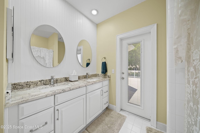 1407 Rockledge Dr, Rockledge, FL 32955 - bathroom with double vanity and tile patterned flooring