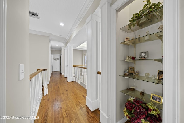 1407 Rockledge Dr, Rockledge, FL 32955 - hall with light wood-style flooring, ornamental molding, and recessed lighting