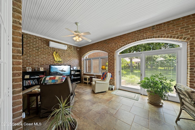 1407 Rockledge Dr, Rockledge, FL 32955 - living area with brick wall, a wall unit AC, ceiling fan, and stone tile flooring