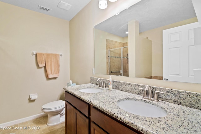 980 Dillard Dr SE, Palm Bay, FL 32909 - bathroom with a shower stall, double vanity, and tile patterned flooring
