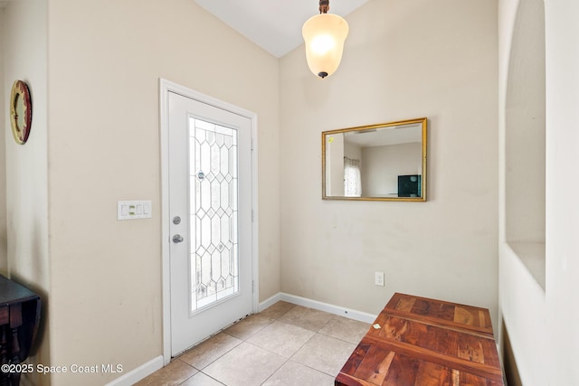 980 Dillard Dr SE, Palm Bay, FL 32909 - foyer featuring tile patterned floors and baseboards