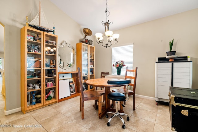 980 Dillard Dr SE, Palm Bay, FL 32909 - dining area featuring a chandelier and light tile patterned floors