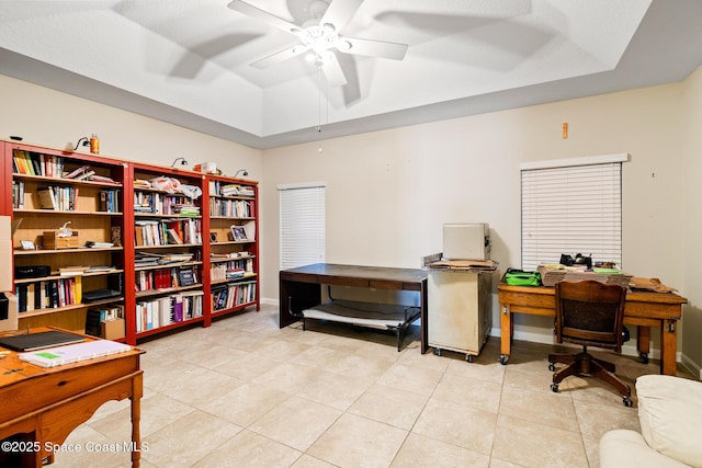 980 Dillard Dr SE, Palm Bay, FL 32909 - office area with a tray ceiling, light tile patterned flooring, and ceiling fan