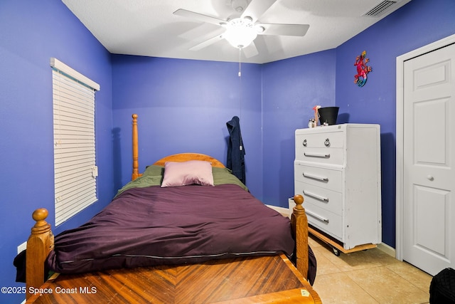 980 Dillard Dr SE, Palm Bay, FL 32909 - bedroom with ceiling fan and tile patterned floors