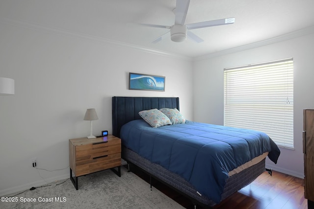 112 Carmen St, Melbourne Beach, FL 32951 - bedroom featuring ornamental molding, ceiling fan, and light wood-type flooring