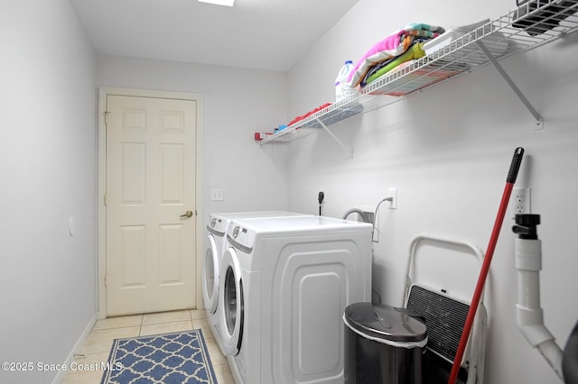 112 Carmen St, Melbourne Beach, FL 32951 - laundry room featuring separate washer and dryer and light tile patterned floors
