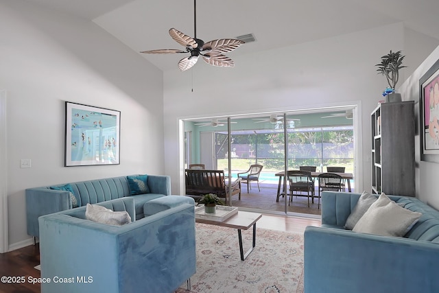 112 Carmen St, Melbourne Beach, FL 32951 - living room featuring a ceiling fan, wood finished floors, and high vaulted ceiling