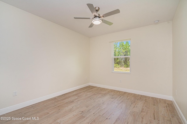 942 Toluca St SE Unit 1, Palm Bay, FL 32909 - spare room with light wood finished floors, a ceiling fan, and a smoke detector