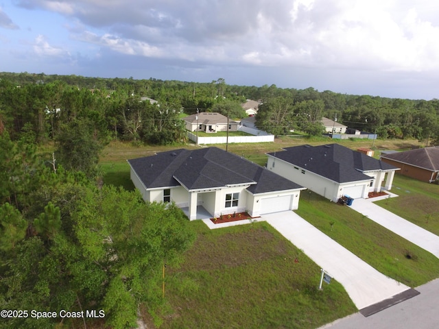 942 Toluca St SE Unit 1, Palm Bay, FL 32909 - view of subject property with a heavily wooded area