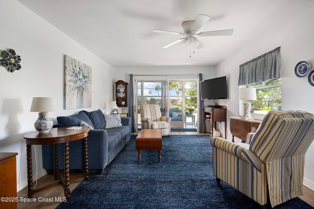 61 Woodland Dr Unit 201, Vero Beach, FL 32962 - living room with wood finished floors and a ceiling fan