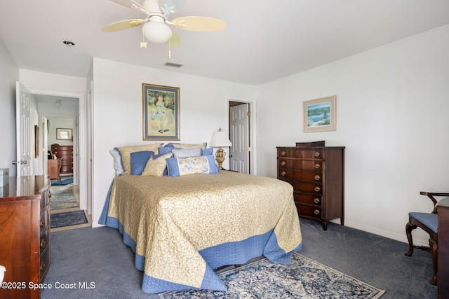 61 Woodland Dr Unit 201, Vero Beach, FL 32962 - carpeted bedroom featuring ceiling fan and baseboards