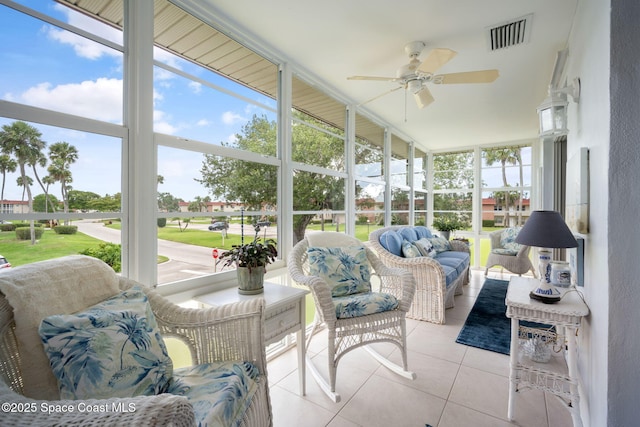 61 Woodland Dr Unit 201, Vero Beach, FL 32962 - sunroom / solarium featuring a ceiling fan, healthy amount of natural light, and an outdoor living space