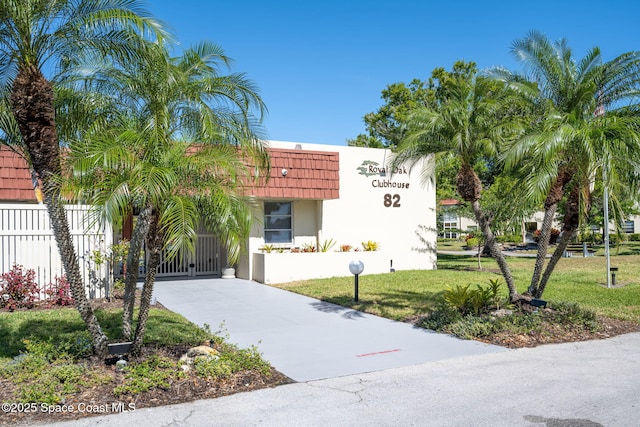 61 Woodland Dr Unit 201, Vero Beach, FL 32962 - view of property with driveway