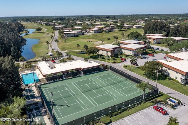 61 Woodland Dr Unit 201, Vero Beach, FL 32962 - drone / aerial view of a nearby body of water and a local golf course