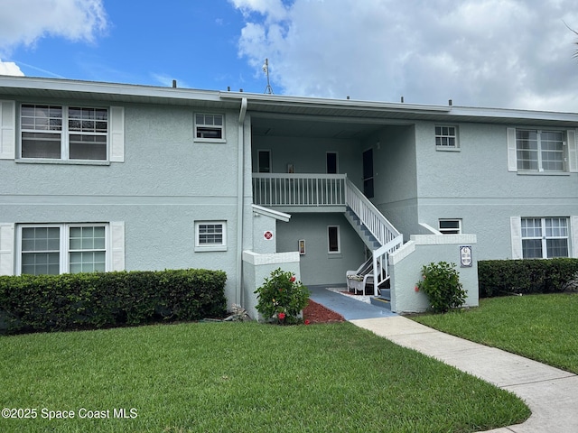 951 Sonesta Ave NE Unit 204, Palm Bay, FL 32905 - view of property with stairway