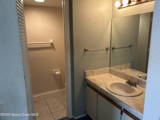 951 Sonesta Ave NE Unit 204, Palm Bay, FL 32905 - bathroom with vanity and tile patterned flooring