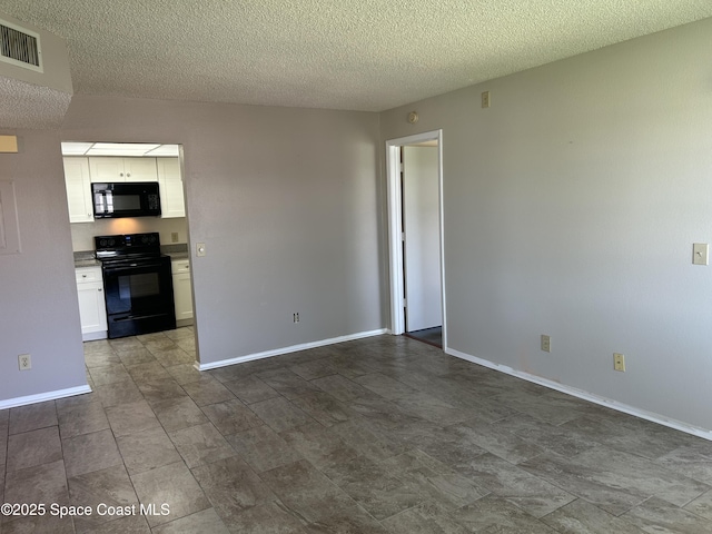 951 Sonesta Ave NE Unit 204, Palm Bay, FL 32905 - unfurnished room with a textured ceiling and baseboards