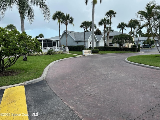 951 Sonesta Ave NE Unit 204, Palm Bay, FL 32905 - view of road with curbs