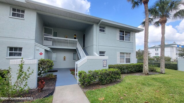951 Sonesta Ave NE Unit 204, Palm Bay, FL 32905 - view of property with stairway