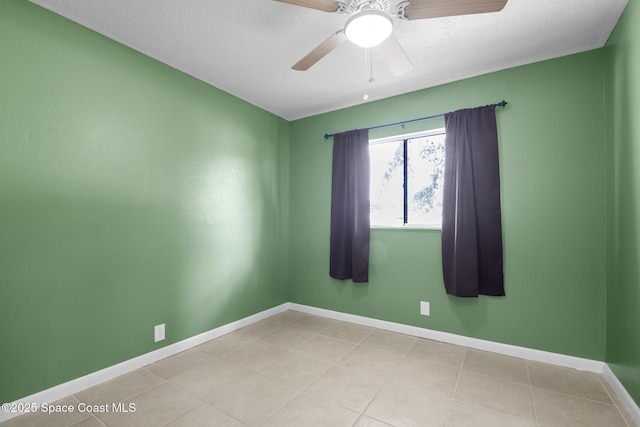 1421 Degroodt Rd SW, Palm Bay, FL 32908 - spare room featuring a ceiling fan and light tile patterned floors