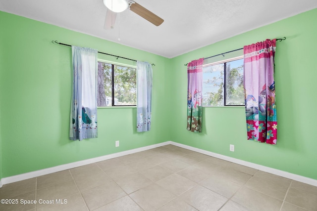 1421 Degroodt Rd SW, Palm Bay, FL 32908 - empty room featuring a ceiling fan and baseboards
