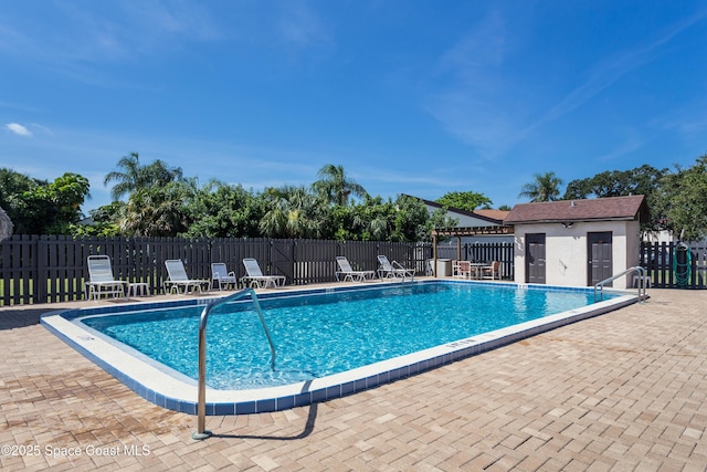 5807 N Atlantic Ave Unit 322, Cape Canaveral, FL 32920 - community pool featuring a patio