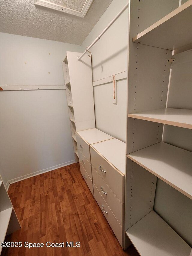 5807 N Atlantic Ave Unit 322, Cape Canaveral, FL 32920 - spacious closet with wood finished floors