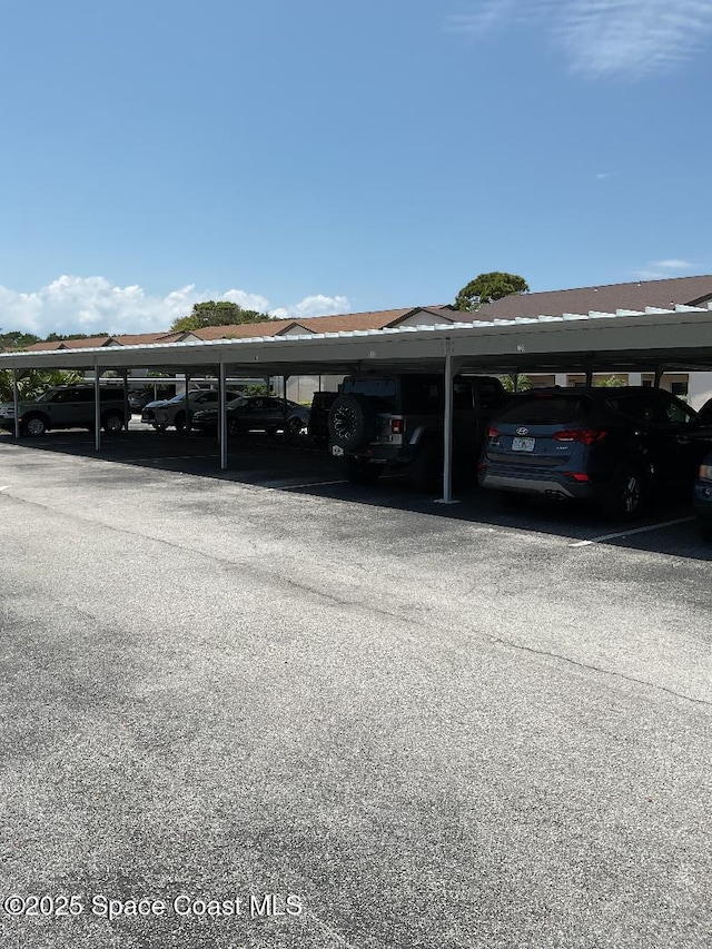 5807 N Atlantic Ave Unit 322, Cape Canaveral, FL 32920 - view of covered parking lot