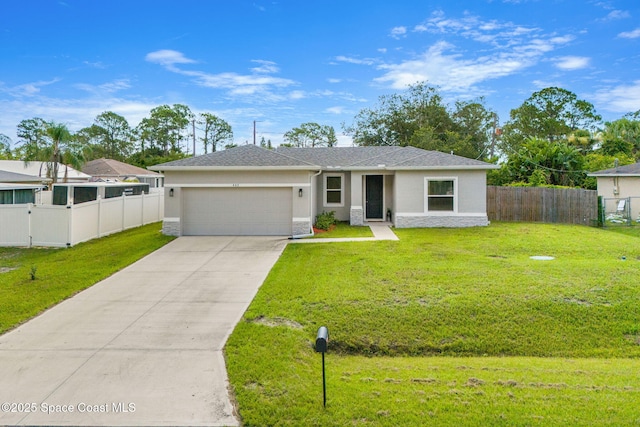 443 Archer Rd SE, Palm Bay, FL 32909 - ranch-style house with a garage, stucco siding, and concrete driveway