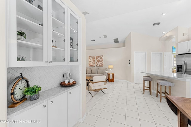 174 Martesia Way, Indian Harbour Beach, FL 32937 - sitting room with light tile patterned floors and baseboards