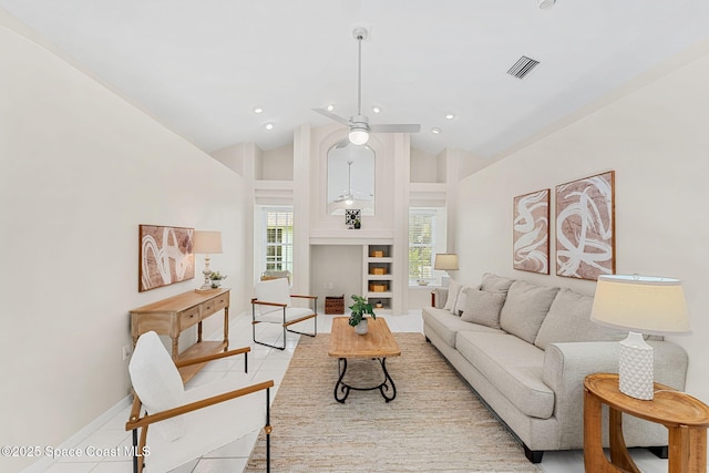 174 Martesia Way, Indian Harbour Beach, FL 32937 - living room featuring high vaulted ceiling, light tile patterned floors, and recessed lighting