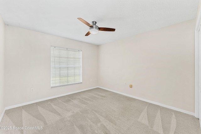 174 Martesia Way, Indian Harbour Beach, FL 32937 - carpeted empty room featuring a ceiling fan and baseboards