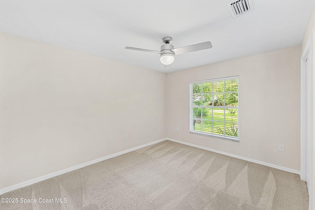 174 Martesia Way, Indian Harbour Beach, FL 32937 - unfurnished room featuring a ceiling fan and light colored carpet