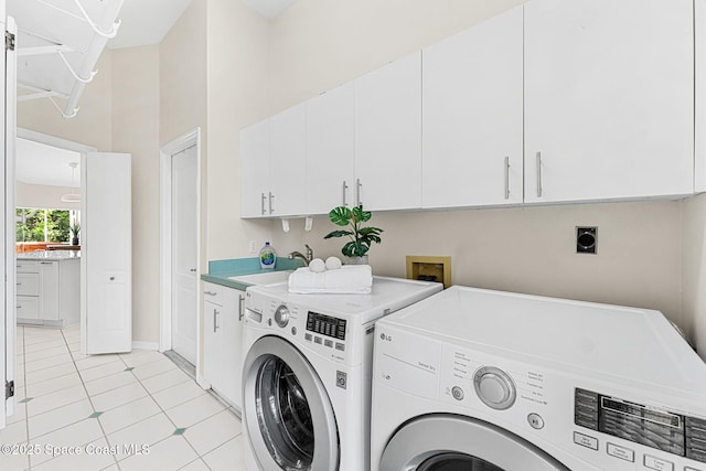 174 Martesia Way, Indian Harbour Beach, FL 32937 - laundry room with separate washer and dryer, cabinet space, and light tile patterned floors