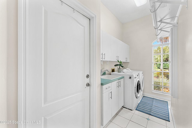 174 Martesia Way, Indian Harbour Beach, FL 32937 - laundry room with cabinet space, washing machine and dryer, and light tile patterned floors