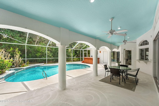 174 Martesia Way, Indian Harbour Beach, FL 32937 - view of pool featuring a patio area, ceiling fan, a lanai, and a pool with connected hot tub