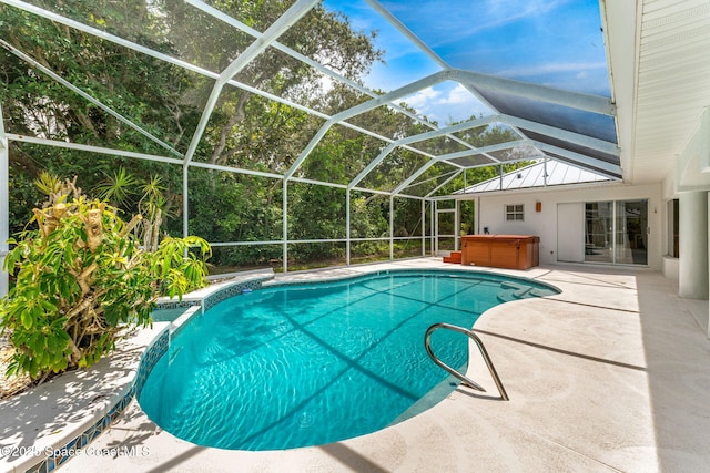 174 Martesia Way, Indian Harbour Beach, FL 32937 - swimming pool featuring a hot tub, a patio, and a lanai