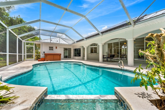 174 Martesia Way, Indian Harbour Beach, FL 32937 - outdoor pool with a hot tub, a patio, and a lanai