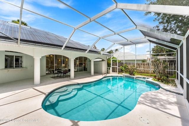 174 Martesia Way, Indian Harbour Beach, FL 32937 - swimming pool featuring a patio area, a lanai, and outdoor dining area